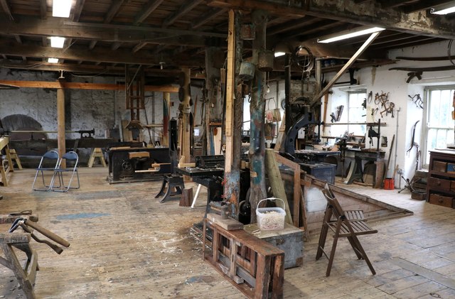 Spindle moulder in the workshop, used for moulding and shaping joinery components.